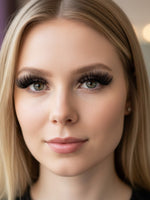 Unique Style 2 Envy Inc Chloe 3D handcrafted mink strip lashes on a blonde woman for a voluminous, natural look.